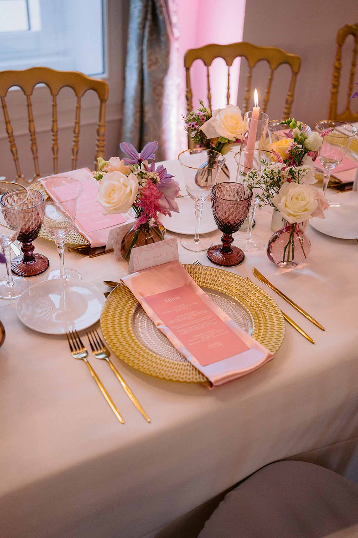 Wedding reception table setting with white roses