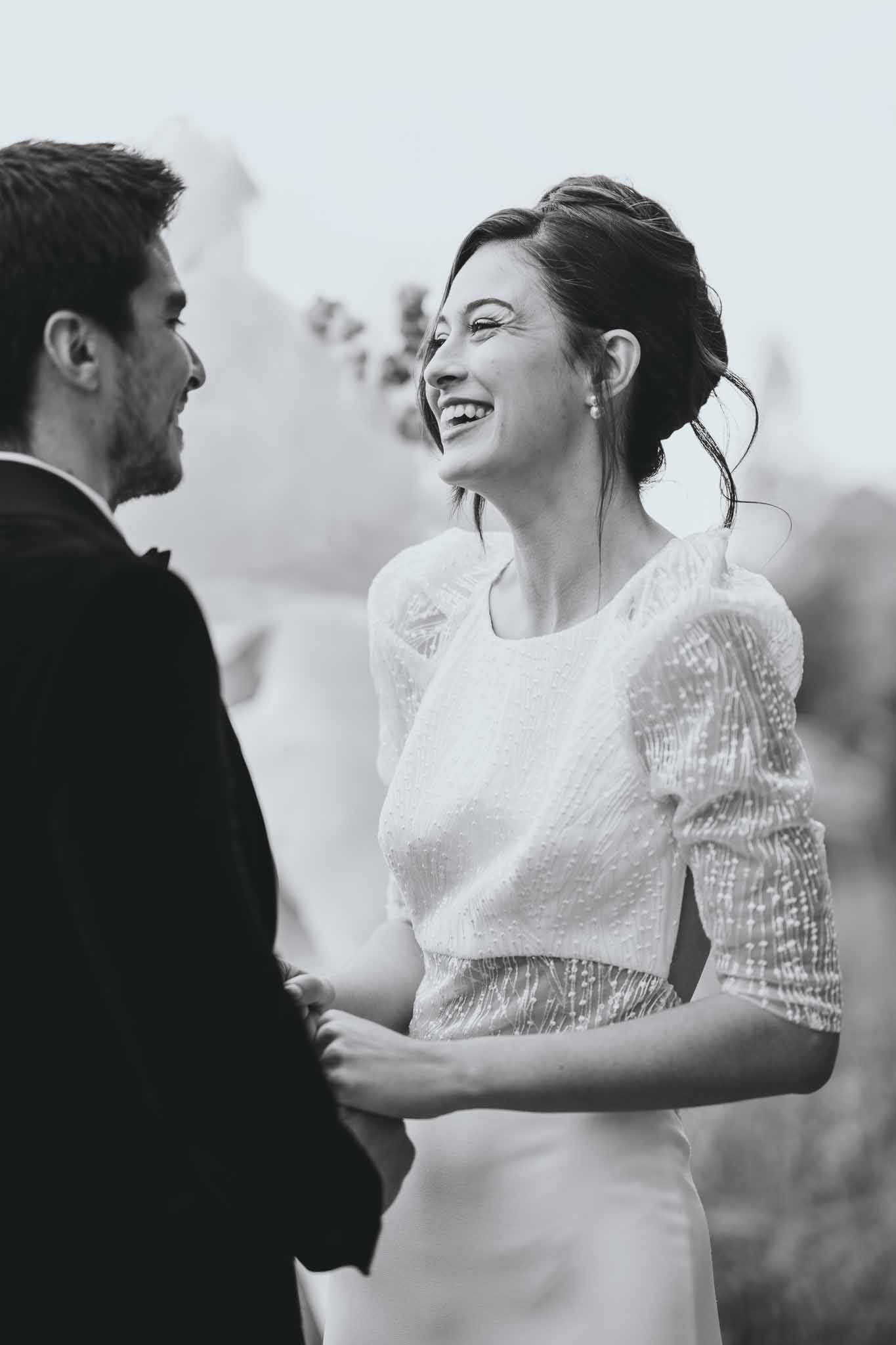 Close-up of couple's hands held together during ceremony at Chateau d'Arcelot