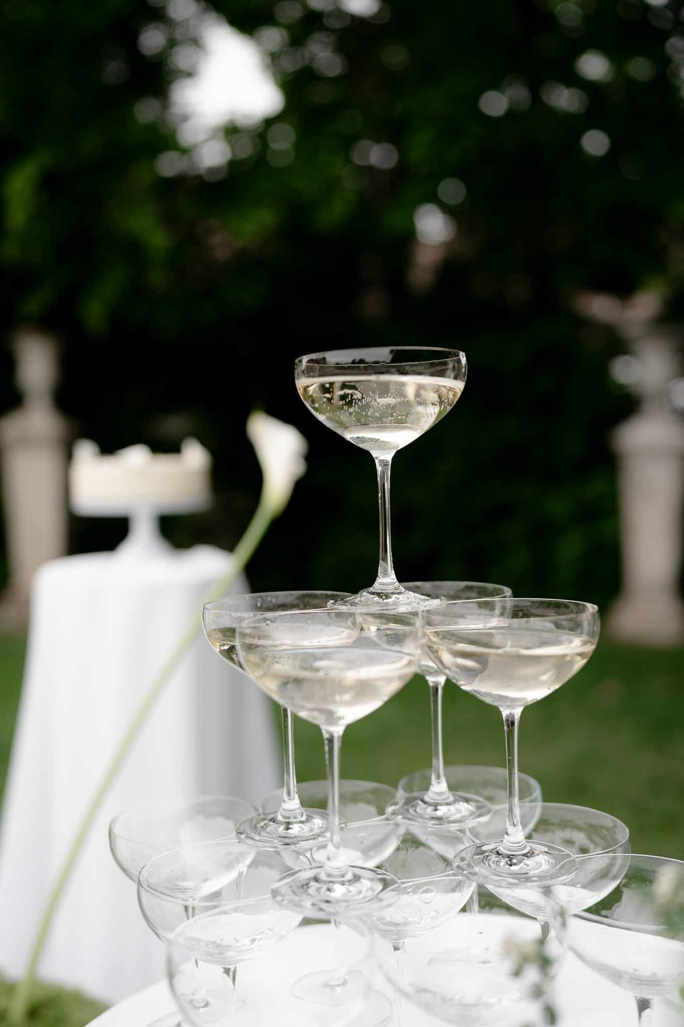 Elegant champagne glass tower on display at the reception
