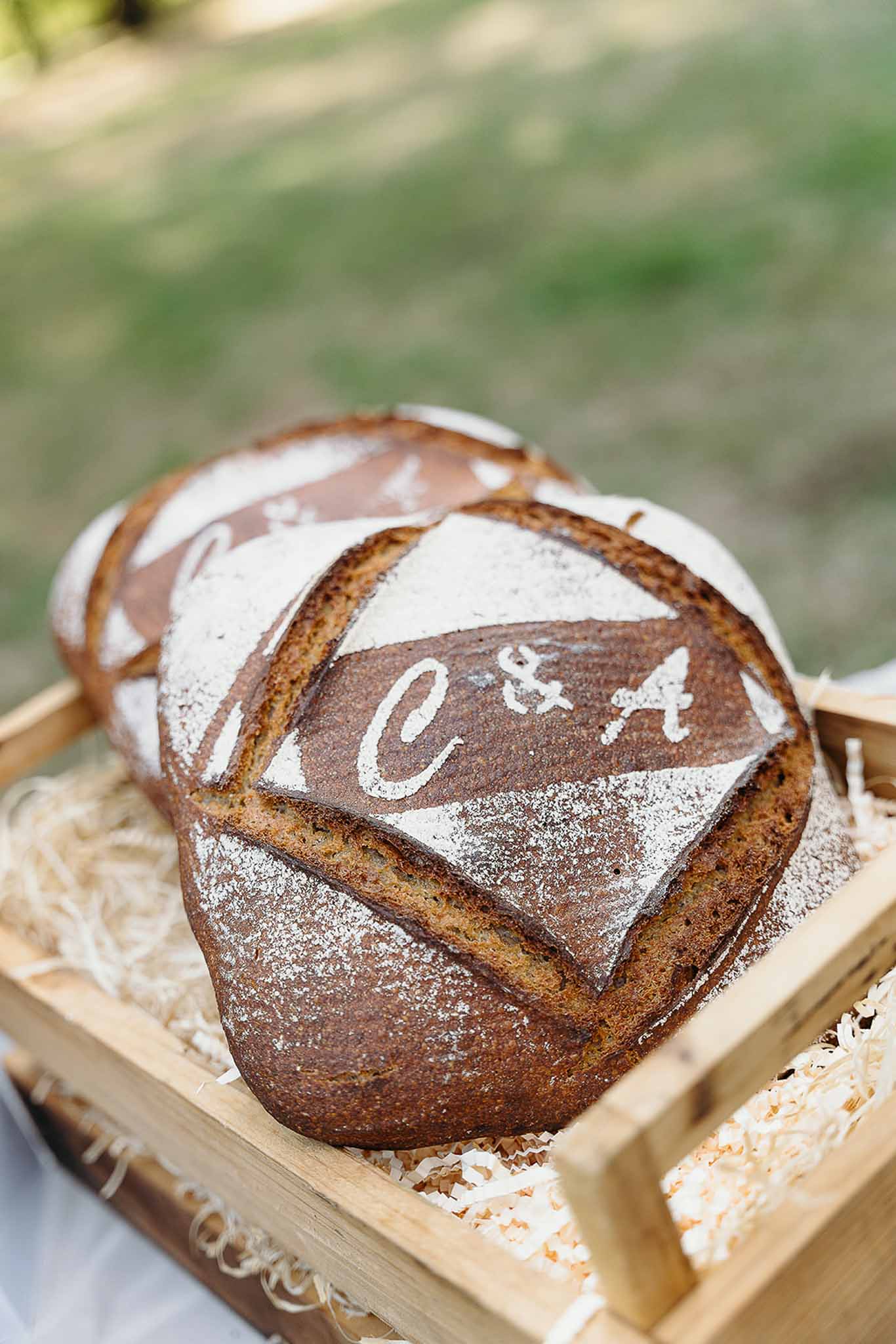Personalised bread arranged on the reception table at Domaine de Perrotin