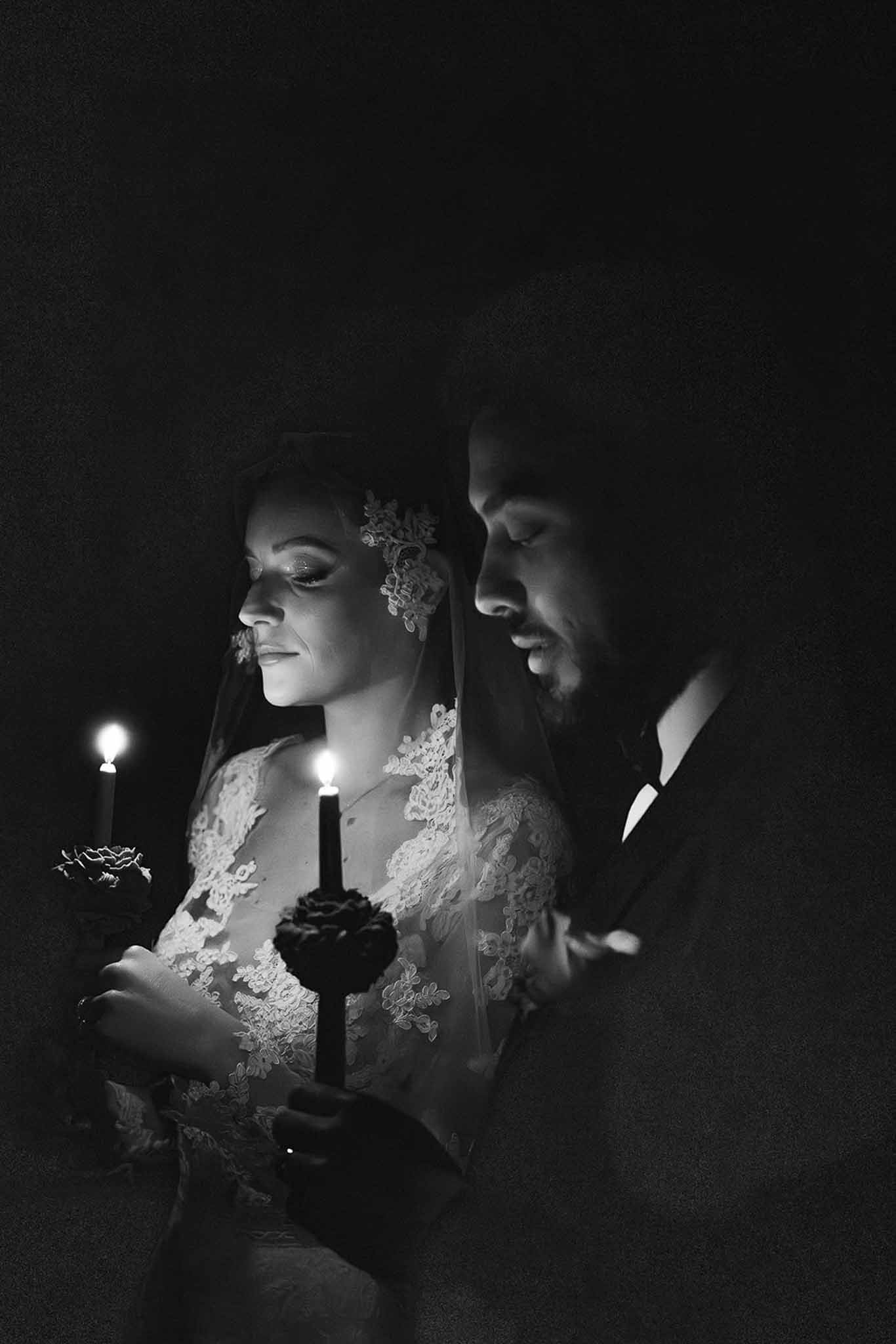 Intimate candlelit couple portrait in black and white at Chateau du Terral