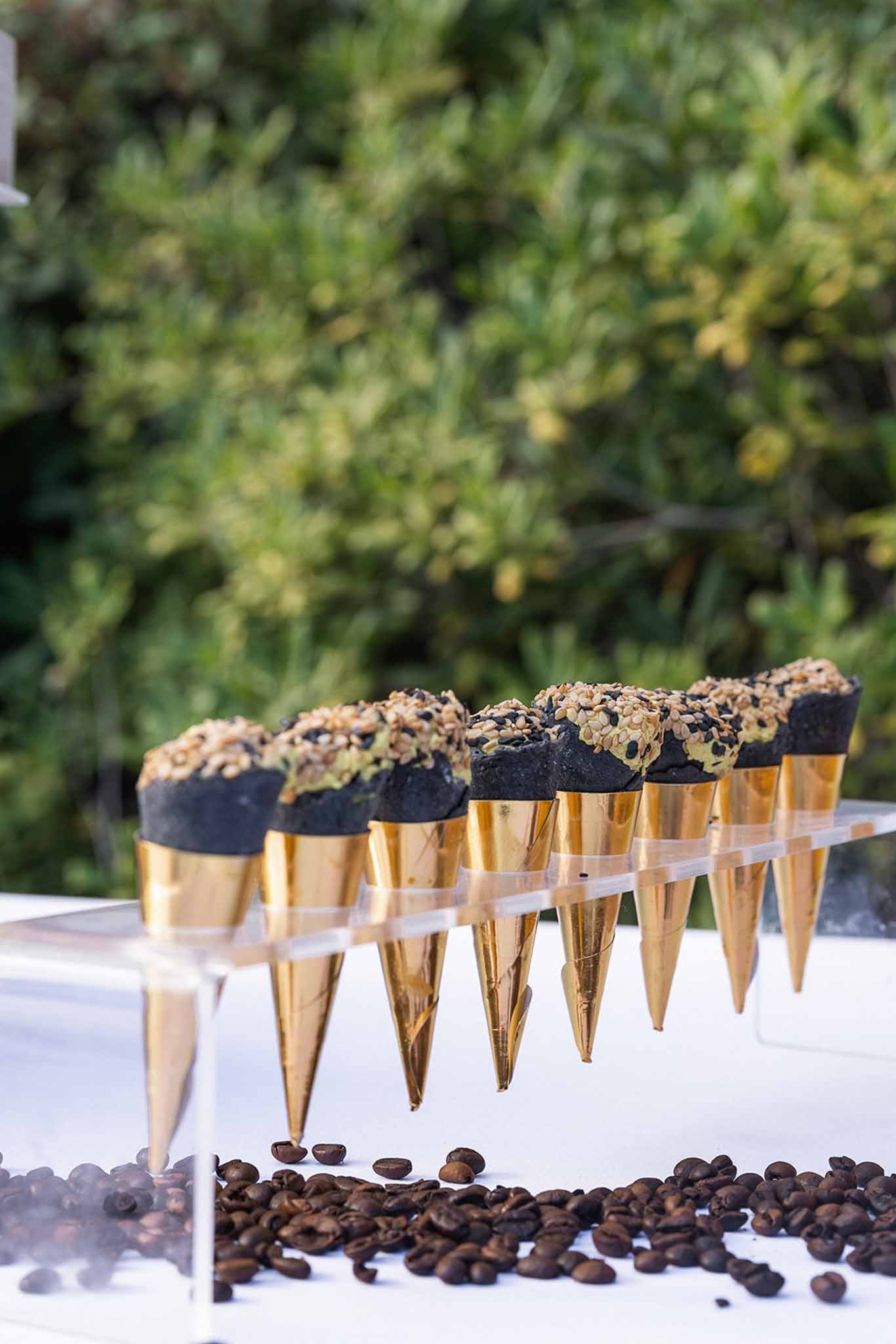 Gold mini ice cream cones with chocolate at Chateau du Terral wedding reception