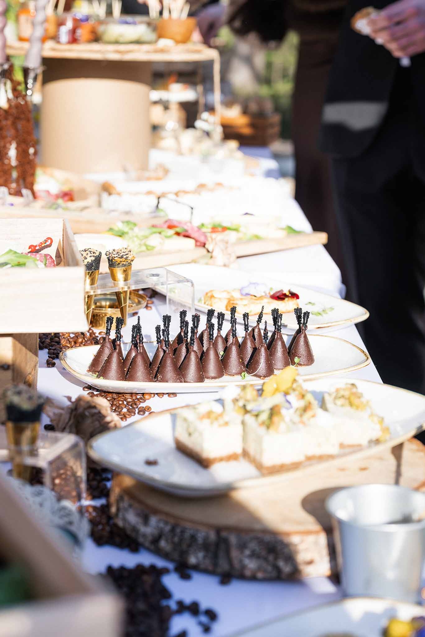 Dessert buffet with chocolate cones and cheesecakes at Chateau du Terral wedding