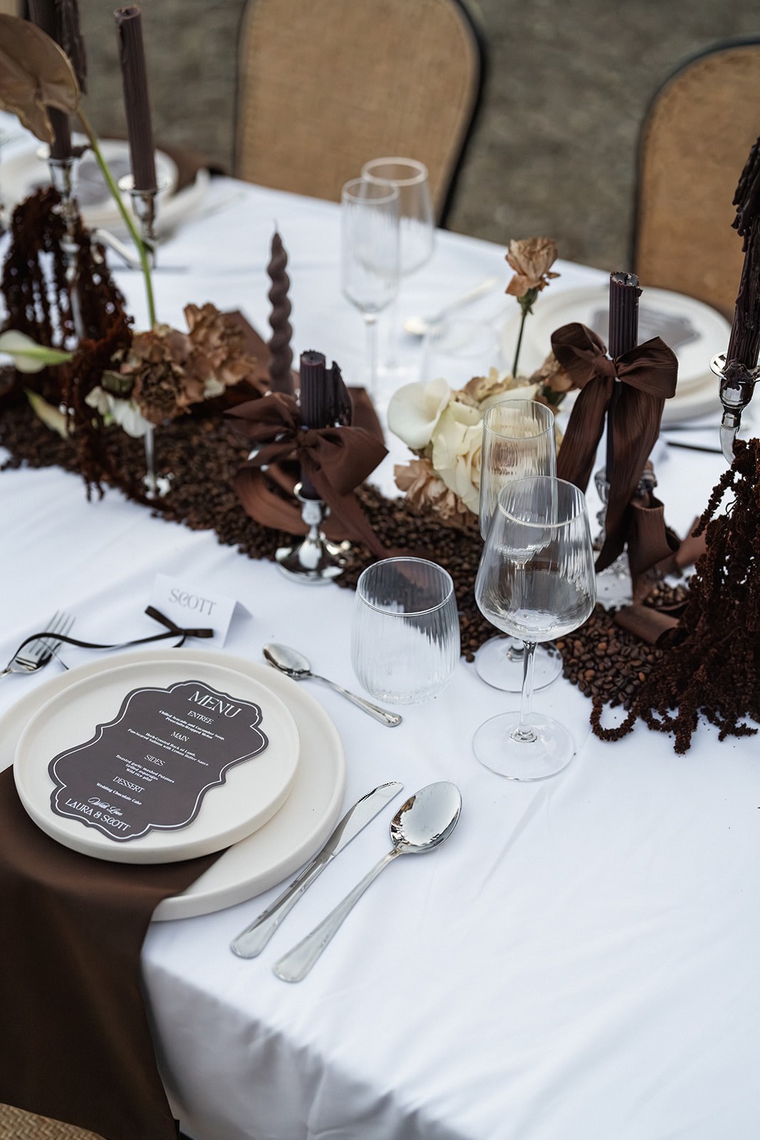 Printed menu card on stoneware plate with mocha tablescape at Chateau du Terral wedding