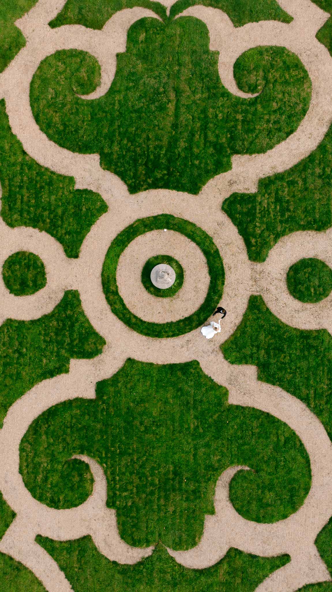 Aerial drone shot of Chateau de Villette and its symmetrical formal gardens