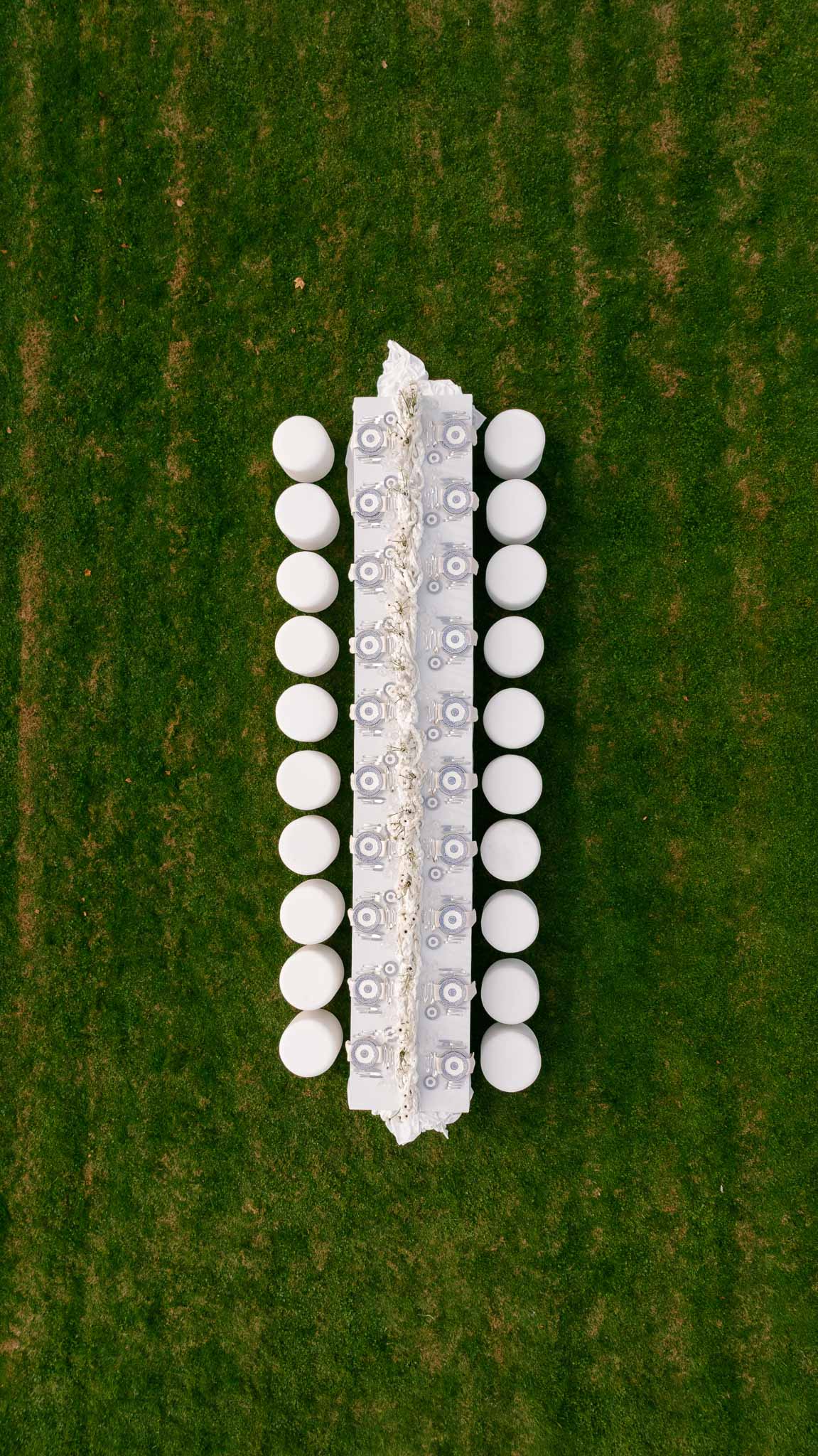 Aerial view of long reception table set for dinner at Chateau de Villette