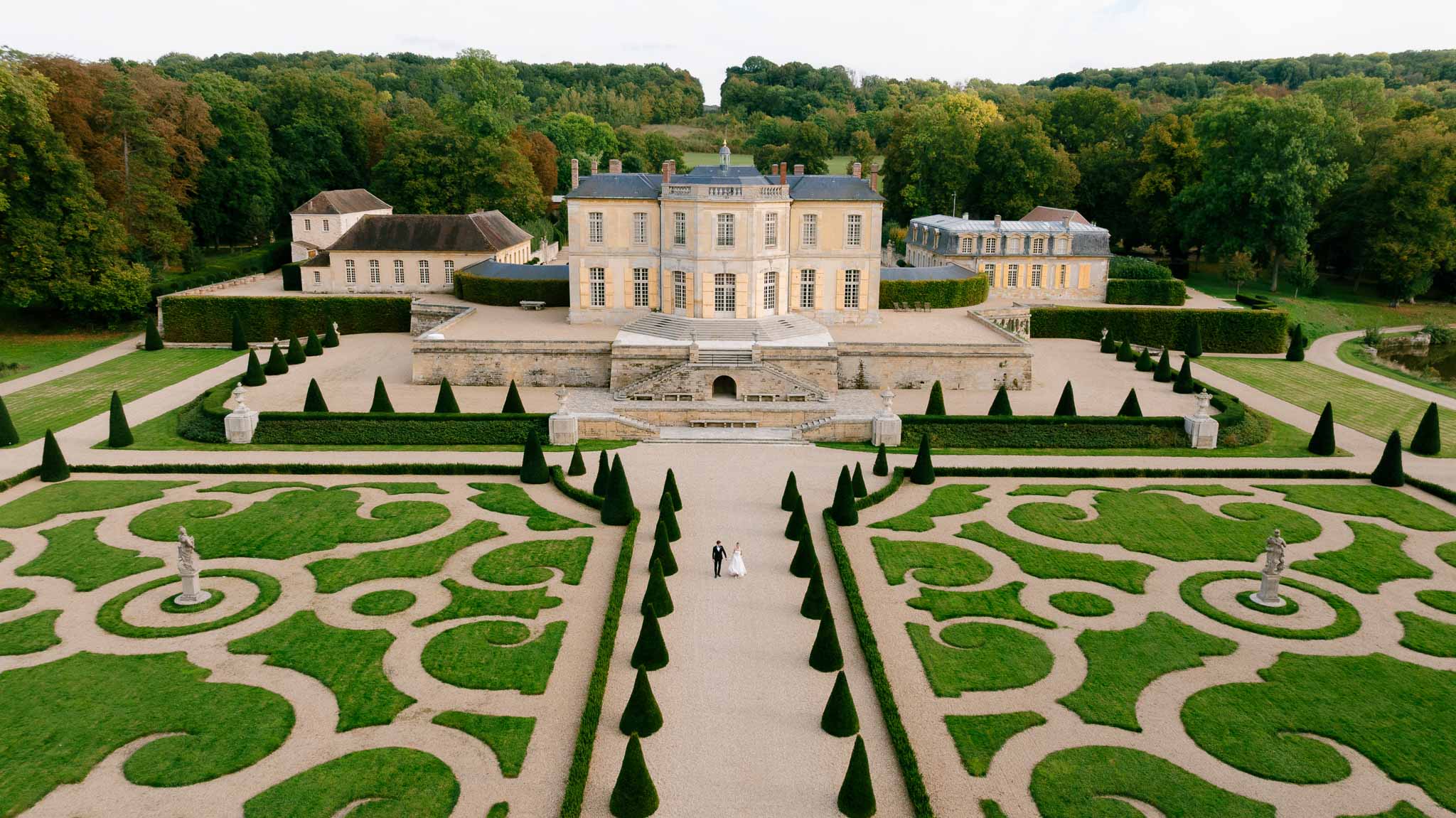 Wide landscape view of Chateau de Villette and its formal gardens