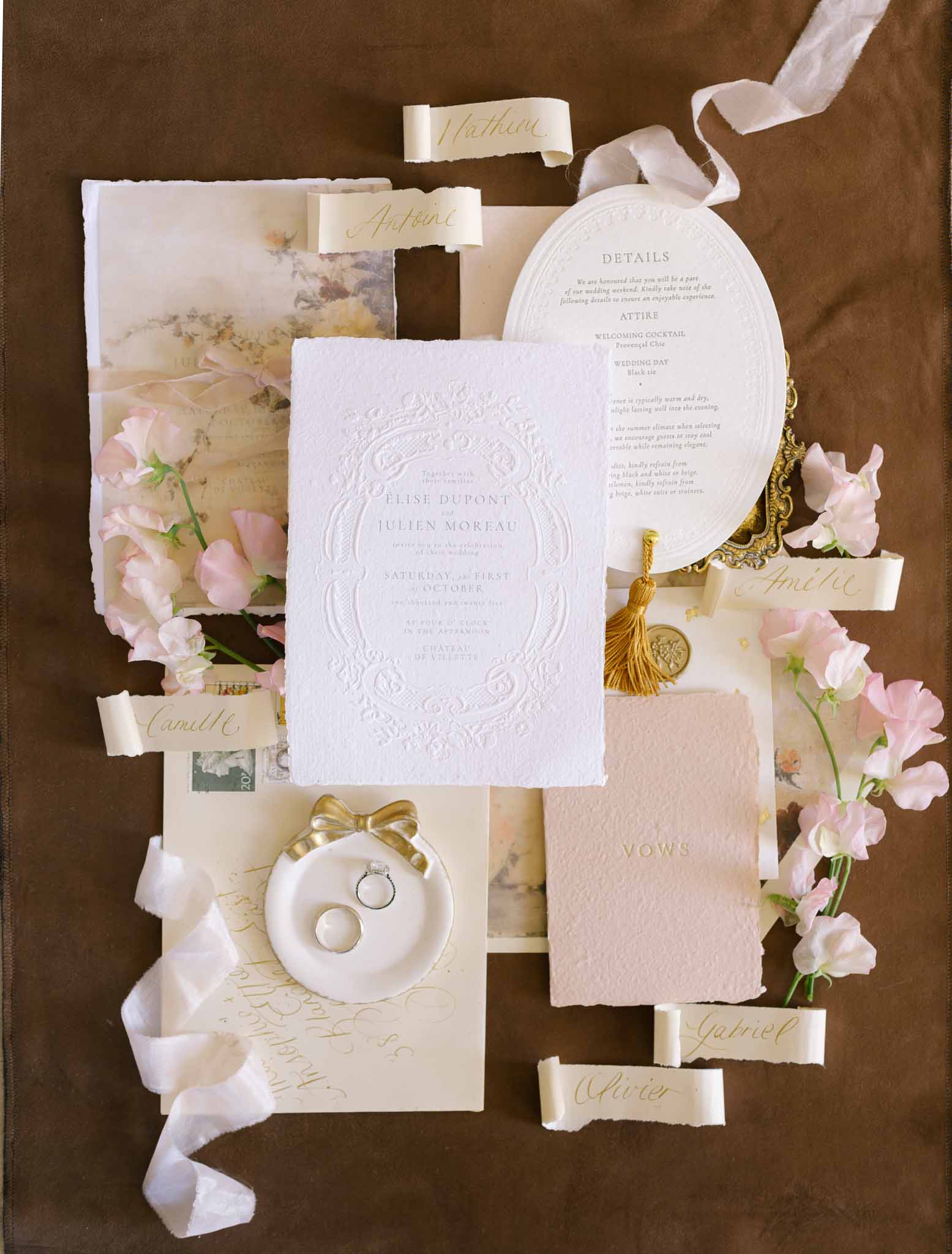Wedding invitation flatlay with pink and gold vintage stationery