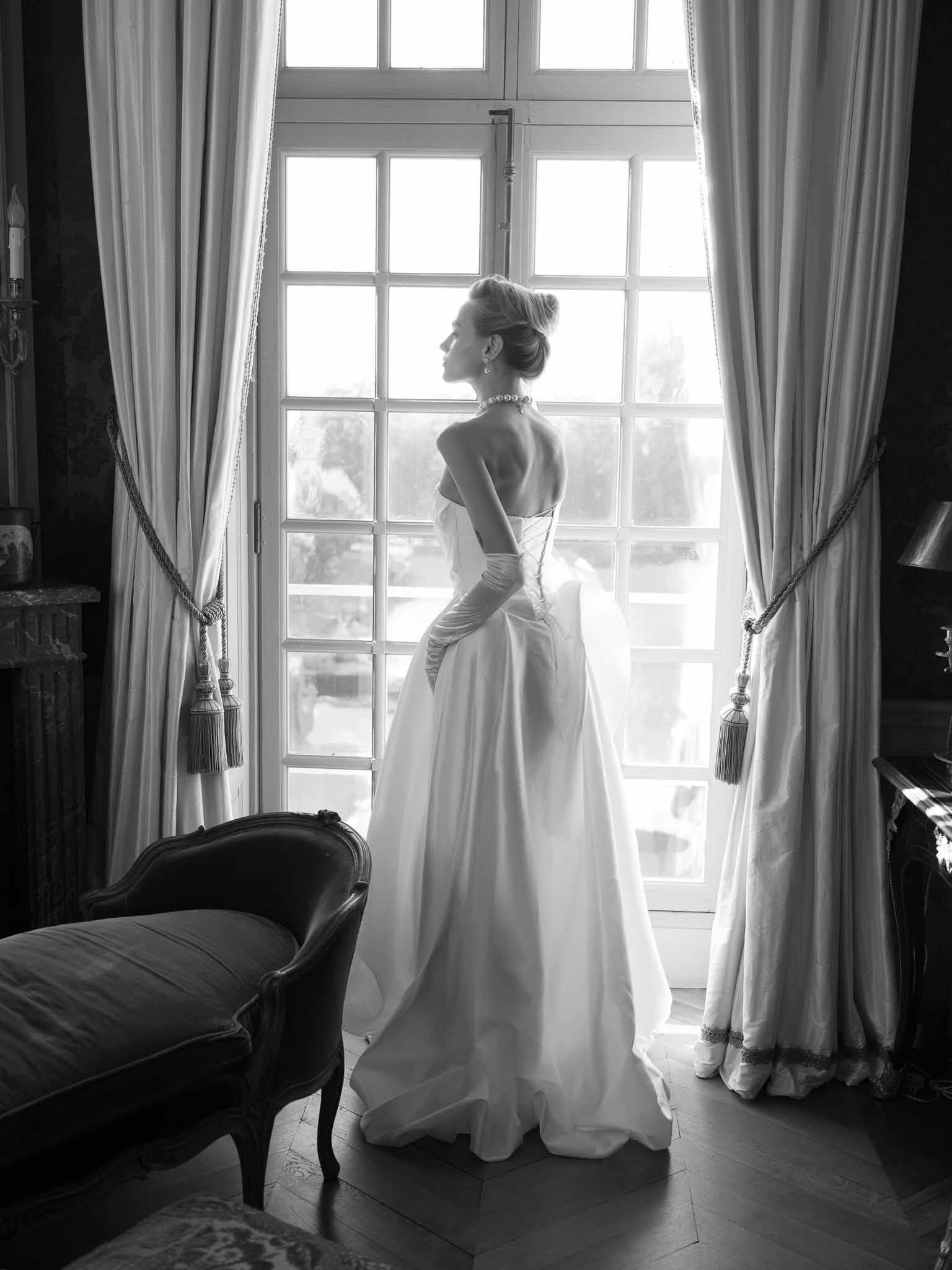 Bride with classic updo hairstyle at Chateau de Villette
